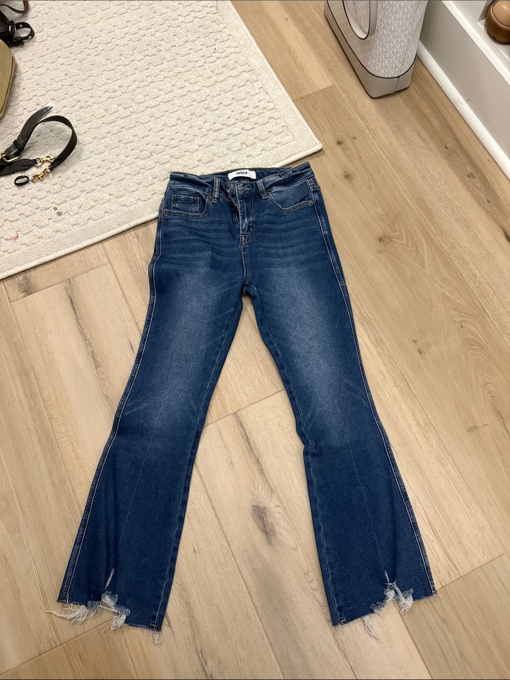 High-Rise Dark Indigo Flare Jeans with Raw Hem